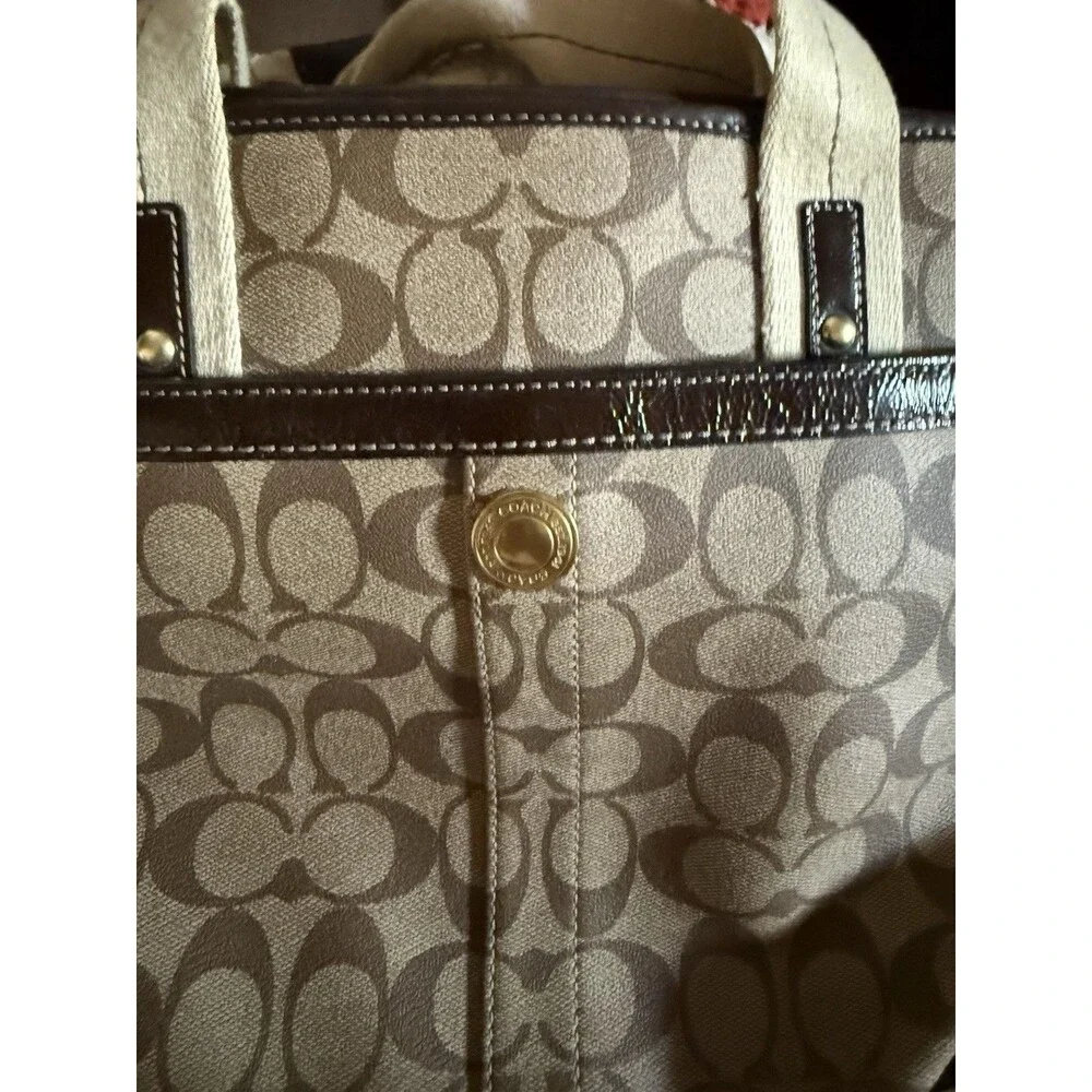 Coach heritage signature